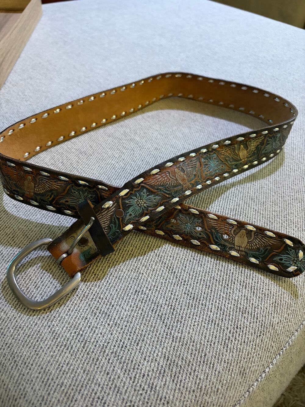 Men’s Y2K studded leather belt with American eagles and green floral.